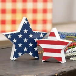 one blue star cutout with white printed stars, one smaller star cutout with red and white stripes. 