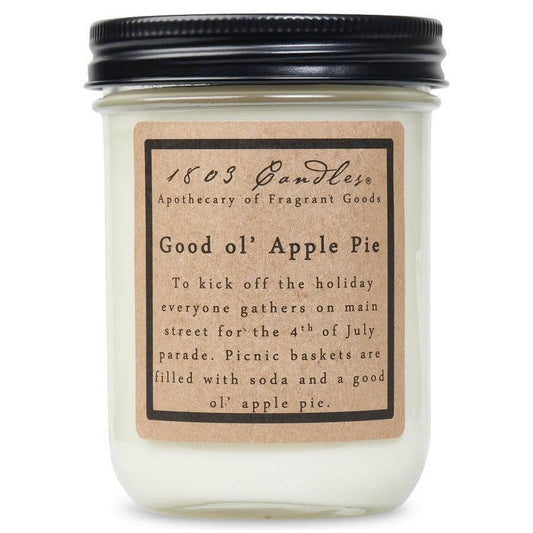 White candle jar with black lid and kraft label, scent is Good Ol Apple Pie