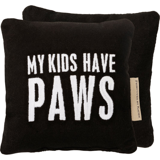 Small black pillow embroidered in white lettering that says My Kids Have Paws