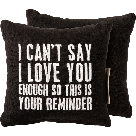 small 6" x 6" black pillow with white lettered embroidery says I can't say i love you enough so this is your reminder